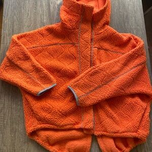 Out from under Sherpa jacket. Baggy fit